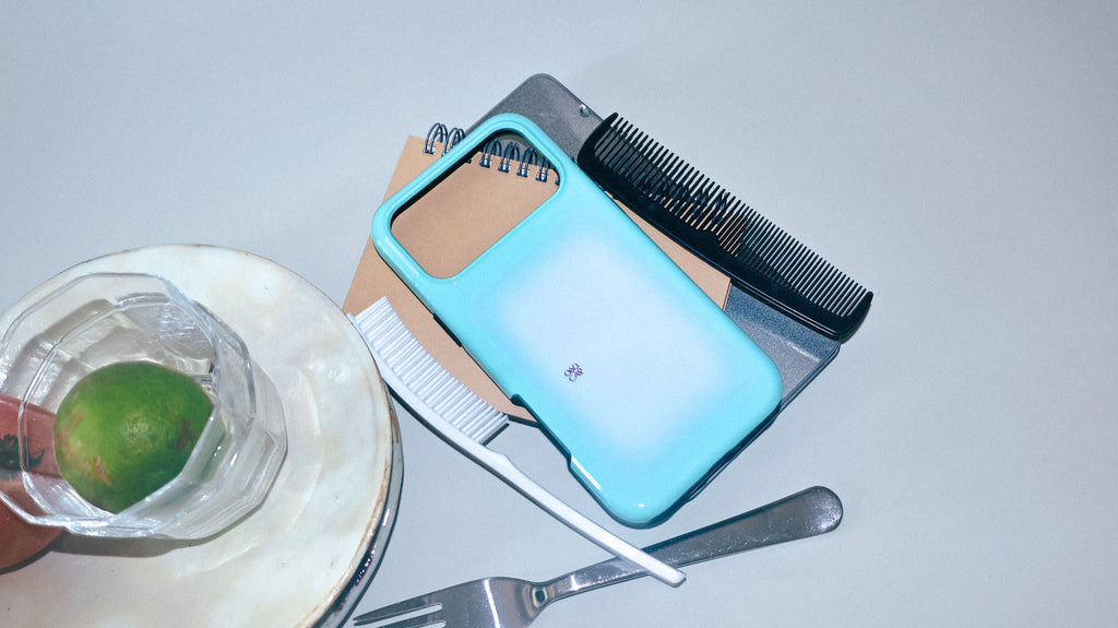 Mint Window aqua gradient MagSafe phone case with lime, notebook and comb