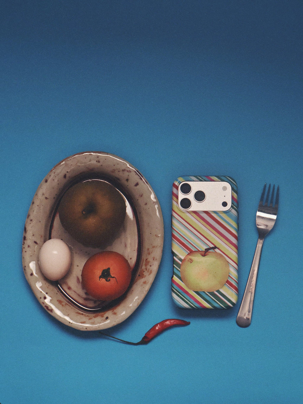 Apple for Later phone case arranged with fruit and tableware