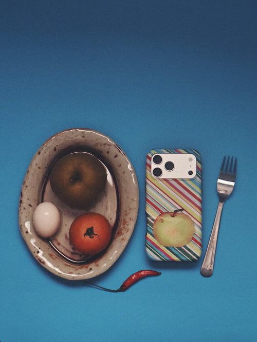 Apple for Later phone case arranged with fruit and tableware
