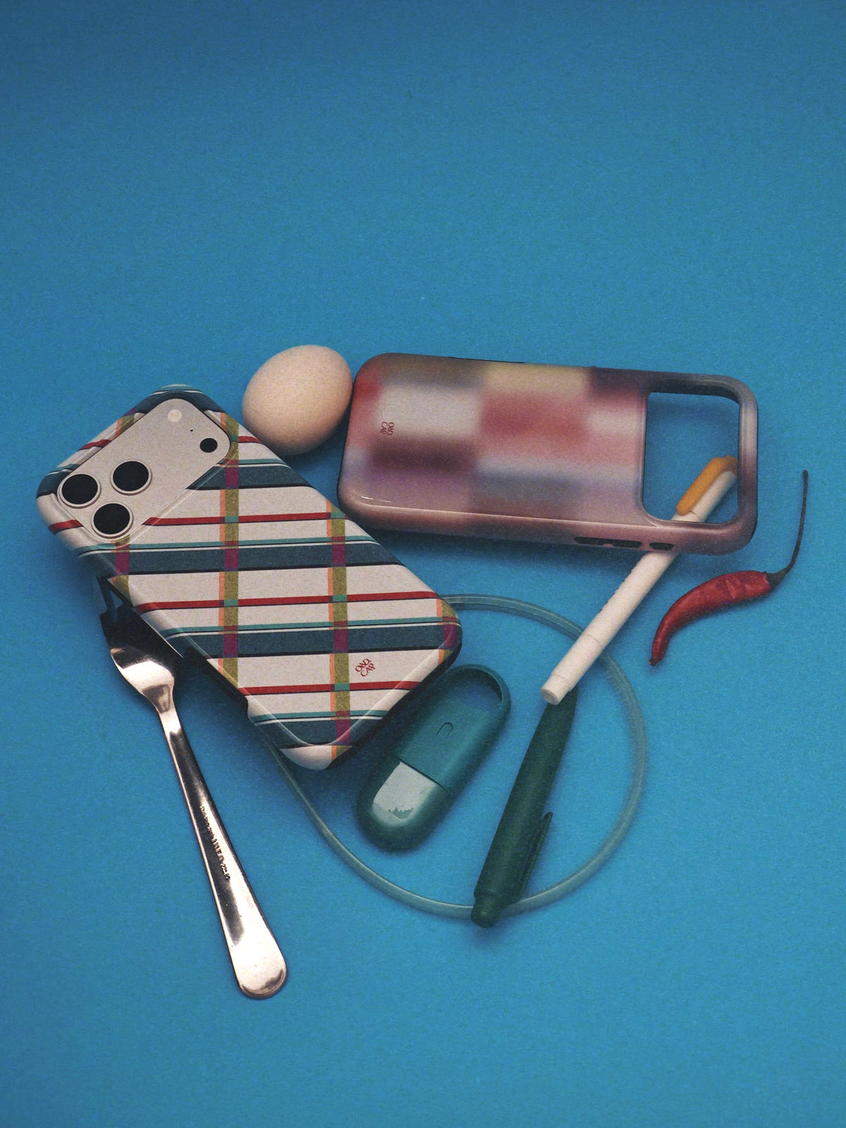 Sideways Check phone case in a blue still life